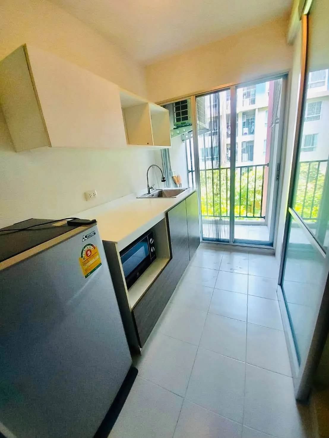 Studio-Eigentumswohnung mit separater Küche zur Miete in dcondo Campus Resort Bangna, 30.5 m², Gebäude Summer (A), 4. Etage, nahe ABAC Bang Na Foto 8