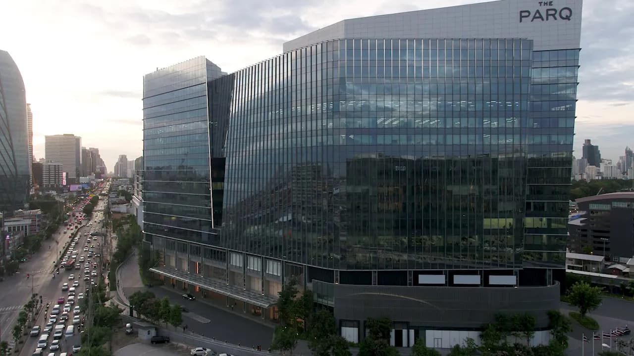 The building at dusk